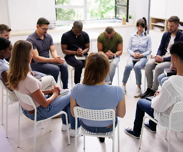 group of people with Bible in hand