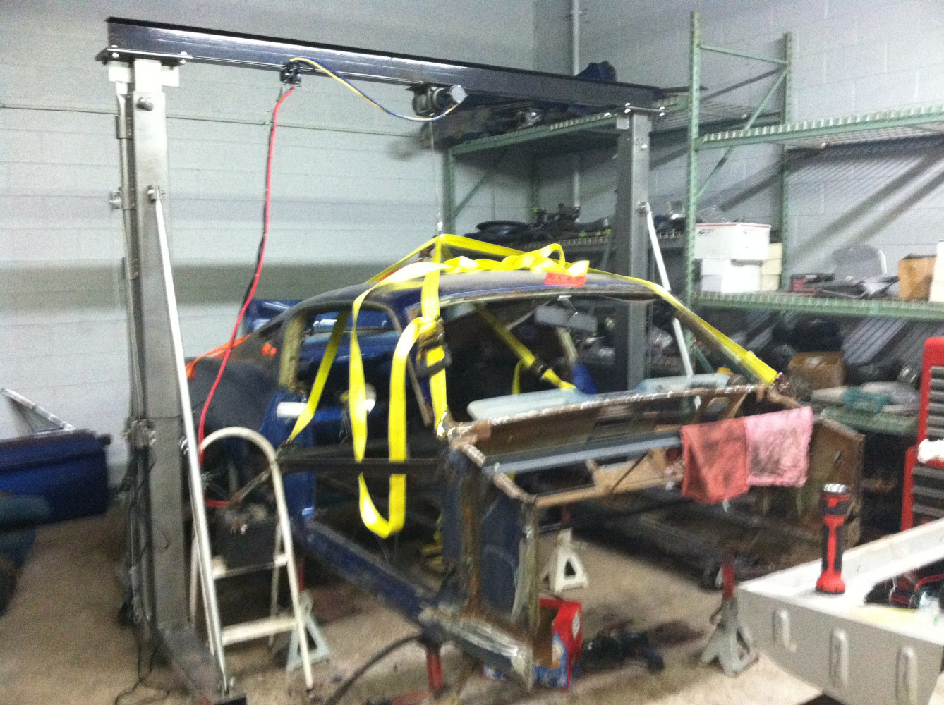 Body lifted up to slide floor under