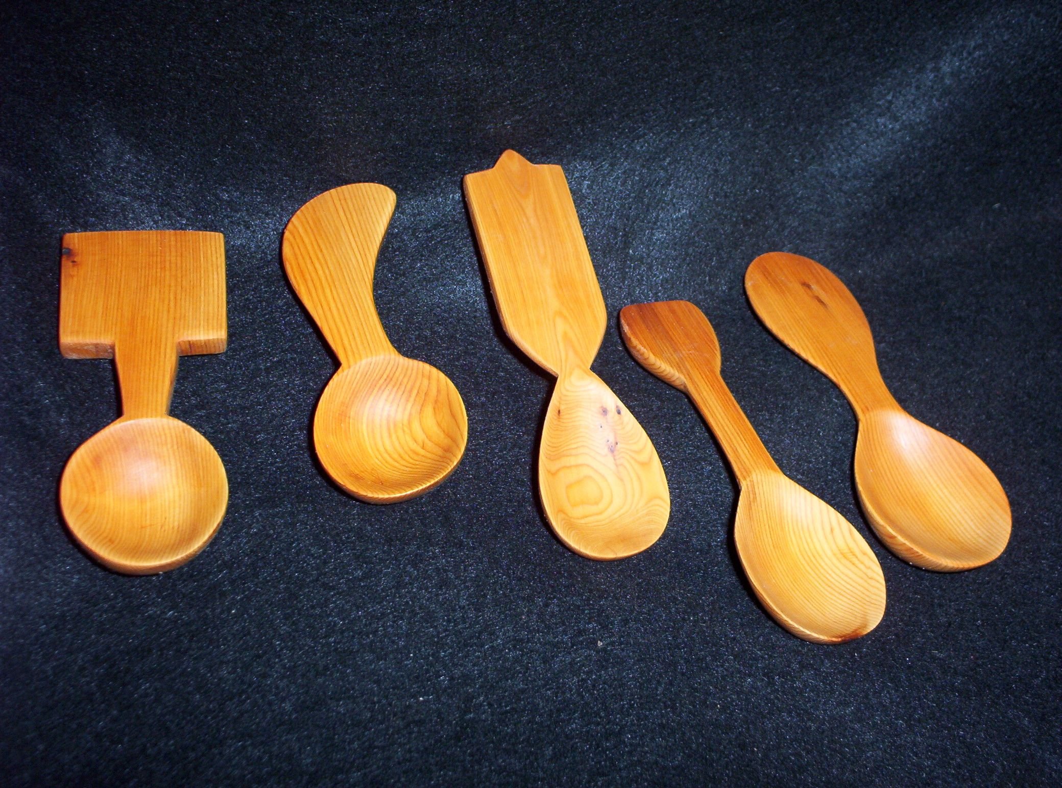 Yew wood carved spoons....   sold