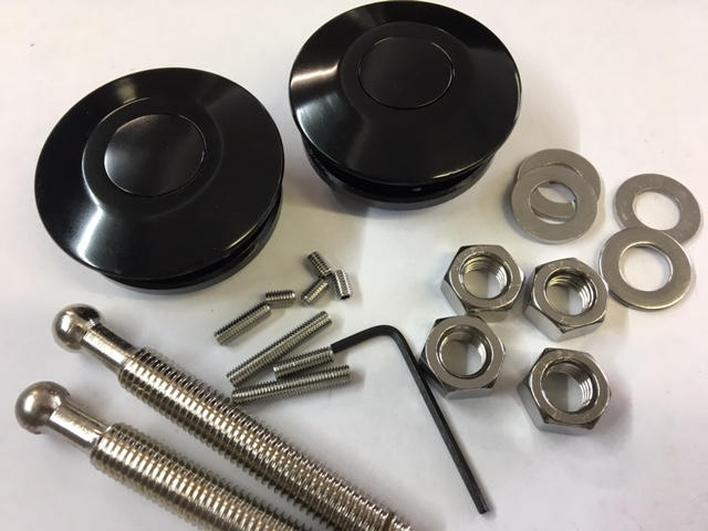 Included are low profile push button hood latches black or chrome. This will eliminate the stock hood latch and catch.
