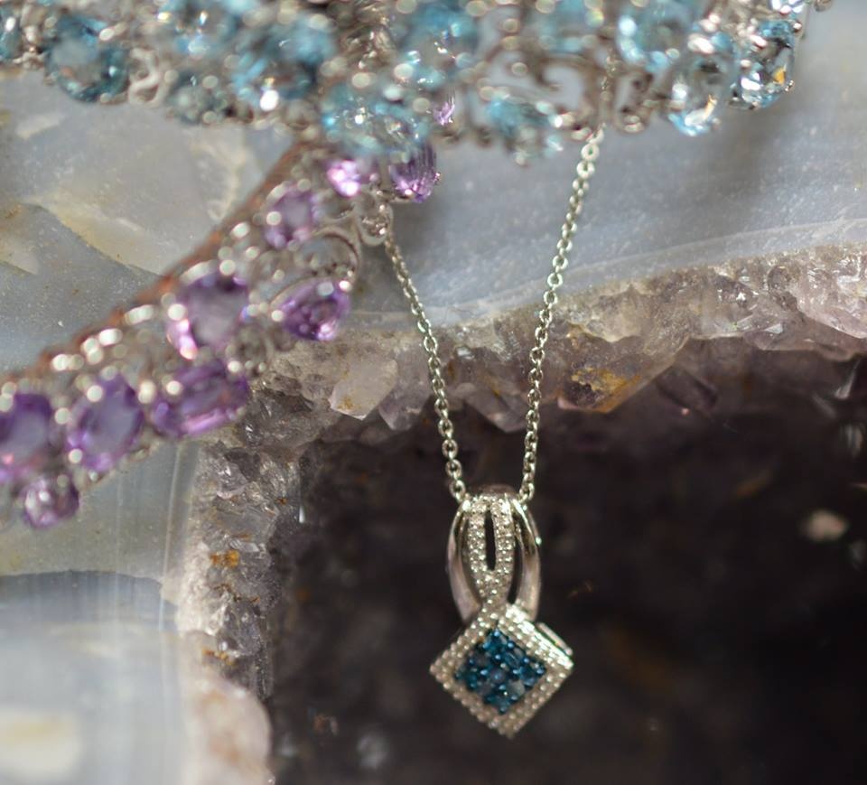 Silver bracelets with blue topaz and amethyst, blue diamond pendant in white gold
