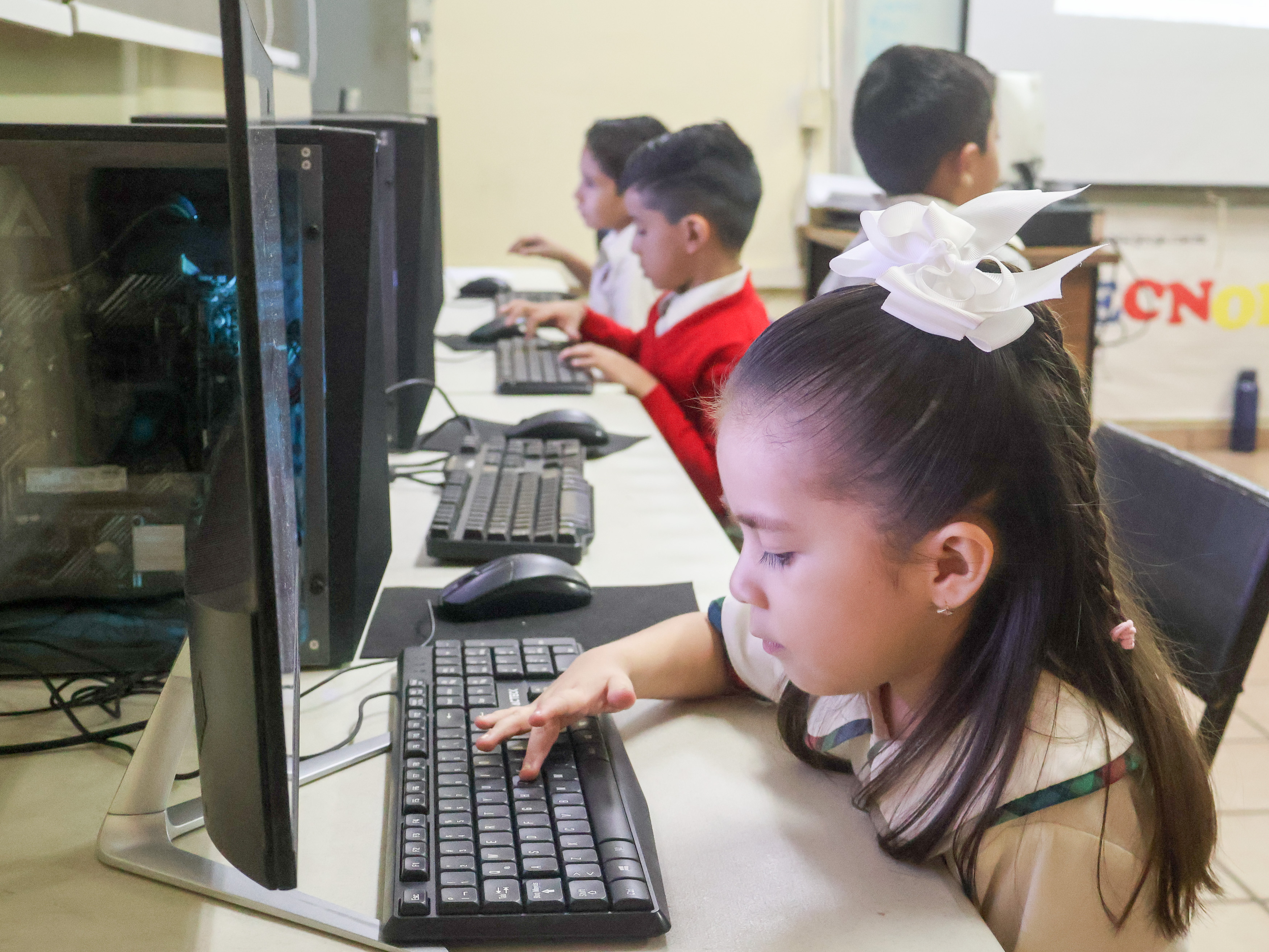 Happy kids holding notebooks