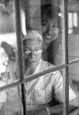 Black and white photo of two women