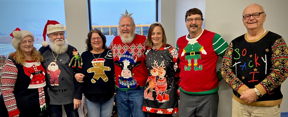 Some of the finalists for the Ugly Sweater contest.
