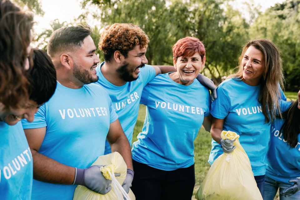 A group of volunteers huddled toegther