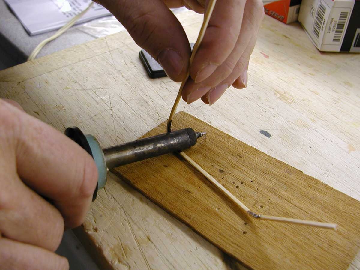 Keep working the piece to get it to conform to the approximate shape of the outline. You do not have to be exact at this point of the process. Some scorching of the wood will occur. That can be sanded off later if it bothers you. You can also use the tip of the iron for small radius bends.