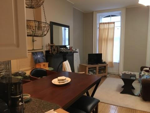 Kitchen looking into living room