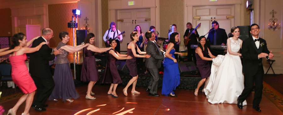 Bride & Groom and wedding quest dancing to the live music. Bride & Groom and wedding quest dancing to the live music.