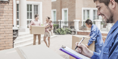 Mover holding clipboard and invoice