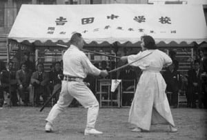 The writing on the tent states "Yoshida Middle School, 1958." 
Ms. Kyoko Nakamura died in the 1960s at which time Nakamura sensei stopped performing and teaching these techniques. 
