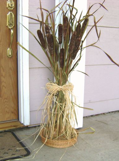 Cattail and raffia outdoor decoration for fall and thanksgiving many hoops