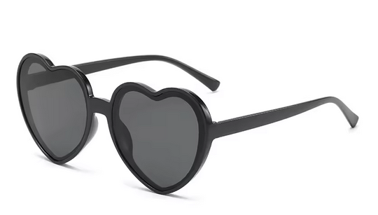 Herzförmige Sonnenbrille für Kinder. Dunkle Brille für Mädchen – transparente Rahmenfarbe. Schwarz