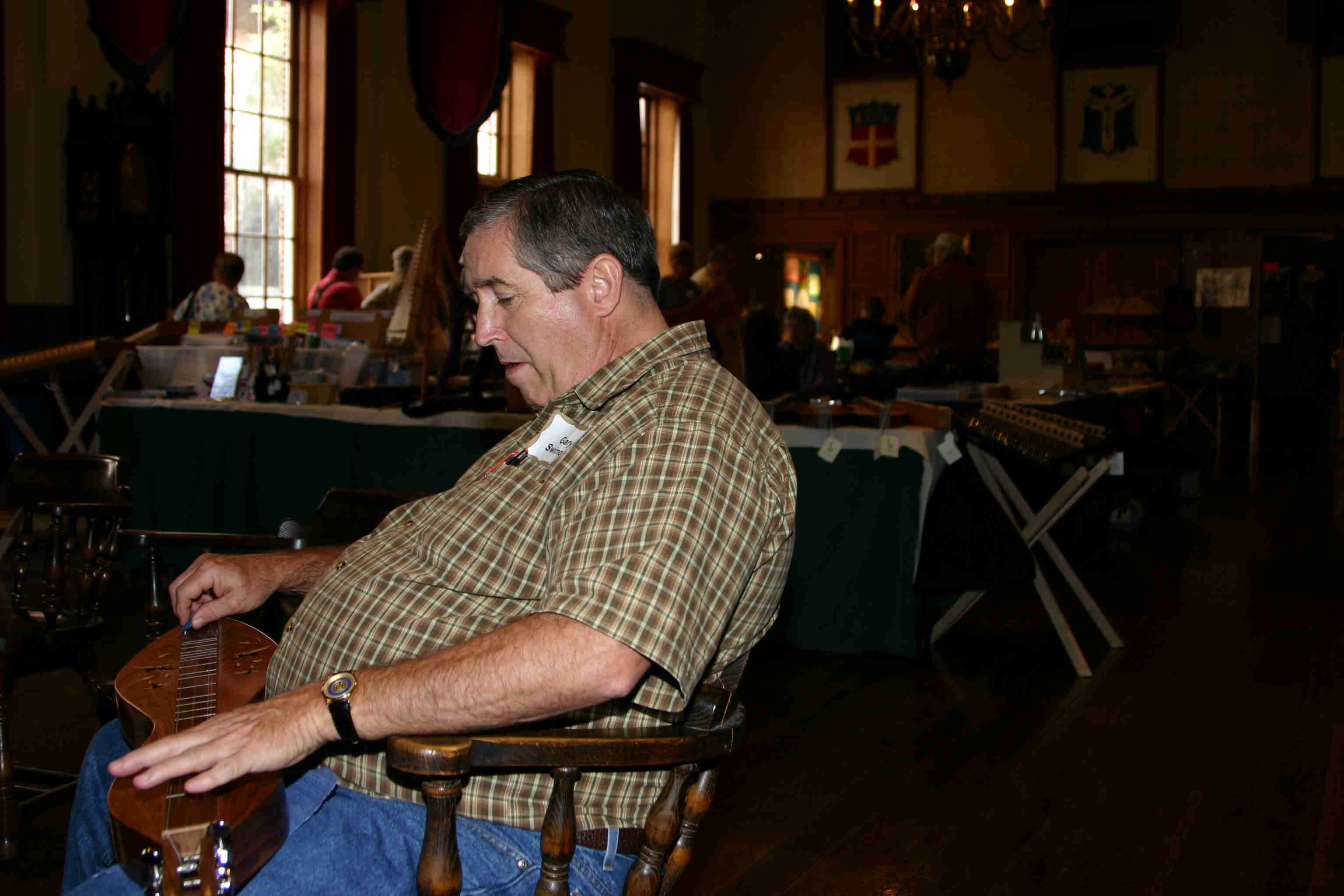 Gary Swinger playing his "ear rings" 2005