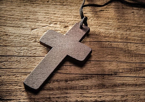 Wooden Cross On Wood Background