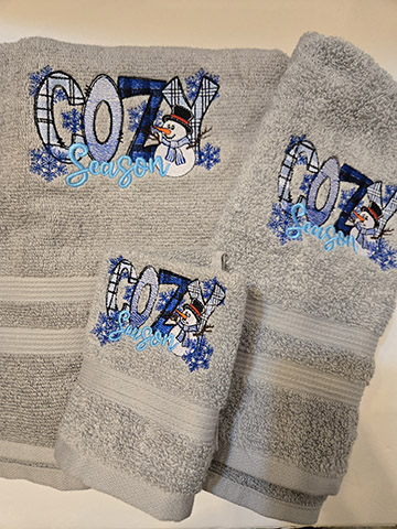 Gray towel set featuring a cozy season design