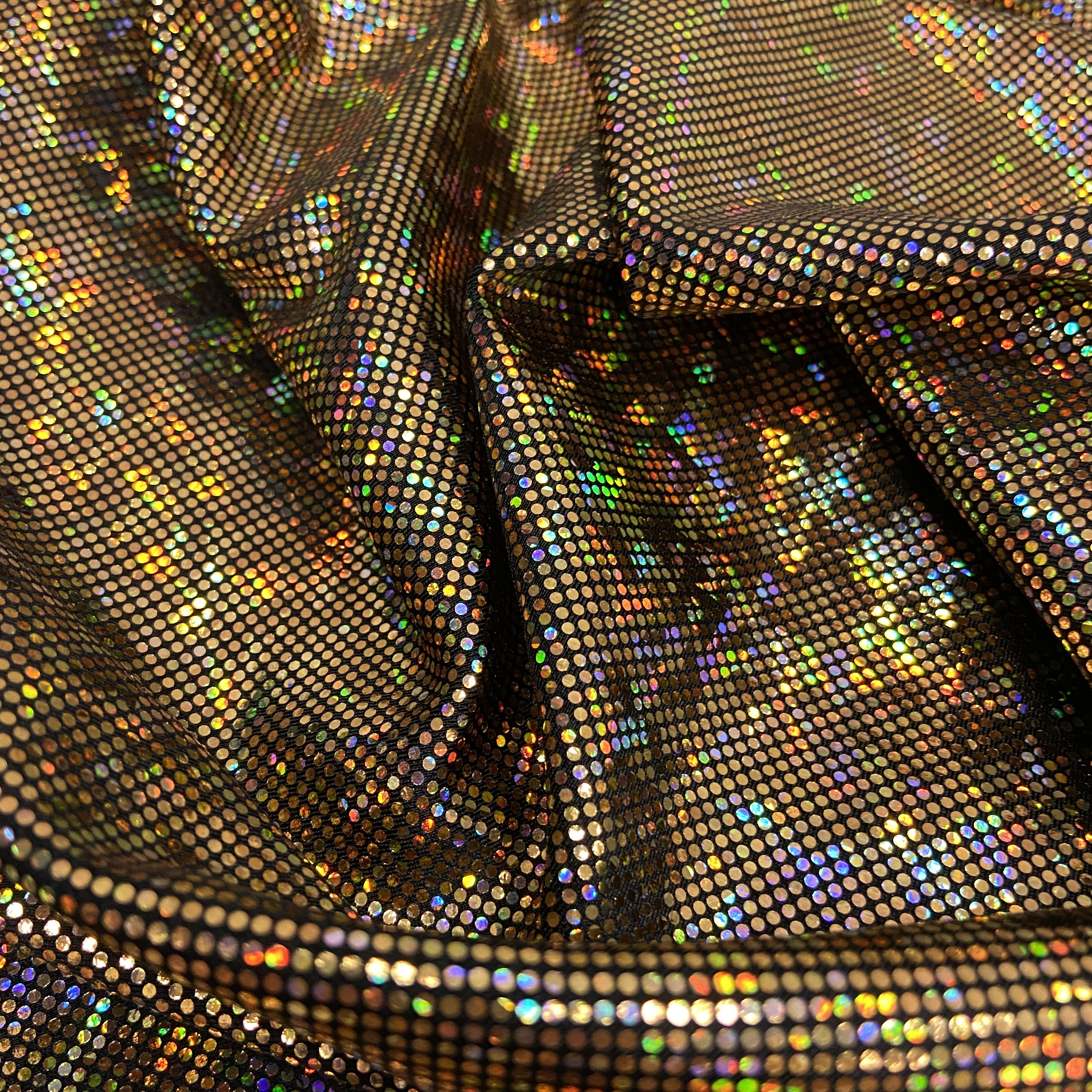 Gold shattered hologram on black
