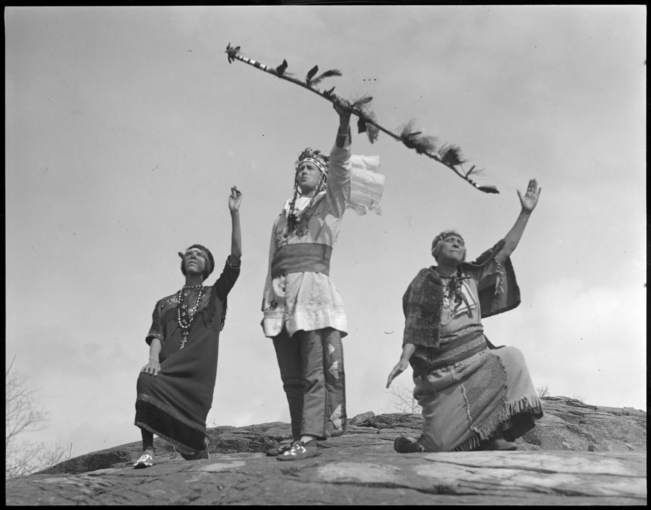 Photo is titled "Mashpee Indian ceremony in Middleborough" circa 1930 from the Leslie Jones collection Boston Public library. Note that this photograph was most probably staged by the photographer which was common in the early 1900's.