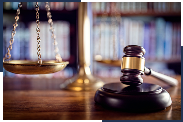 gavel, scales of justice and law book