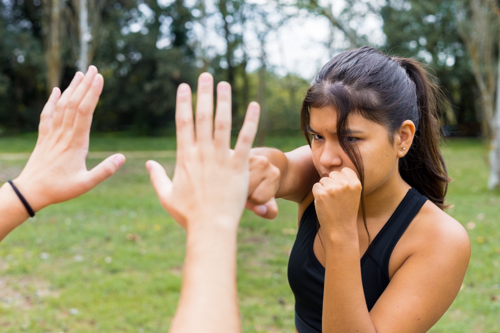 Woman sparing with hands. Woman sparing with hands.