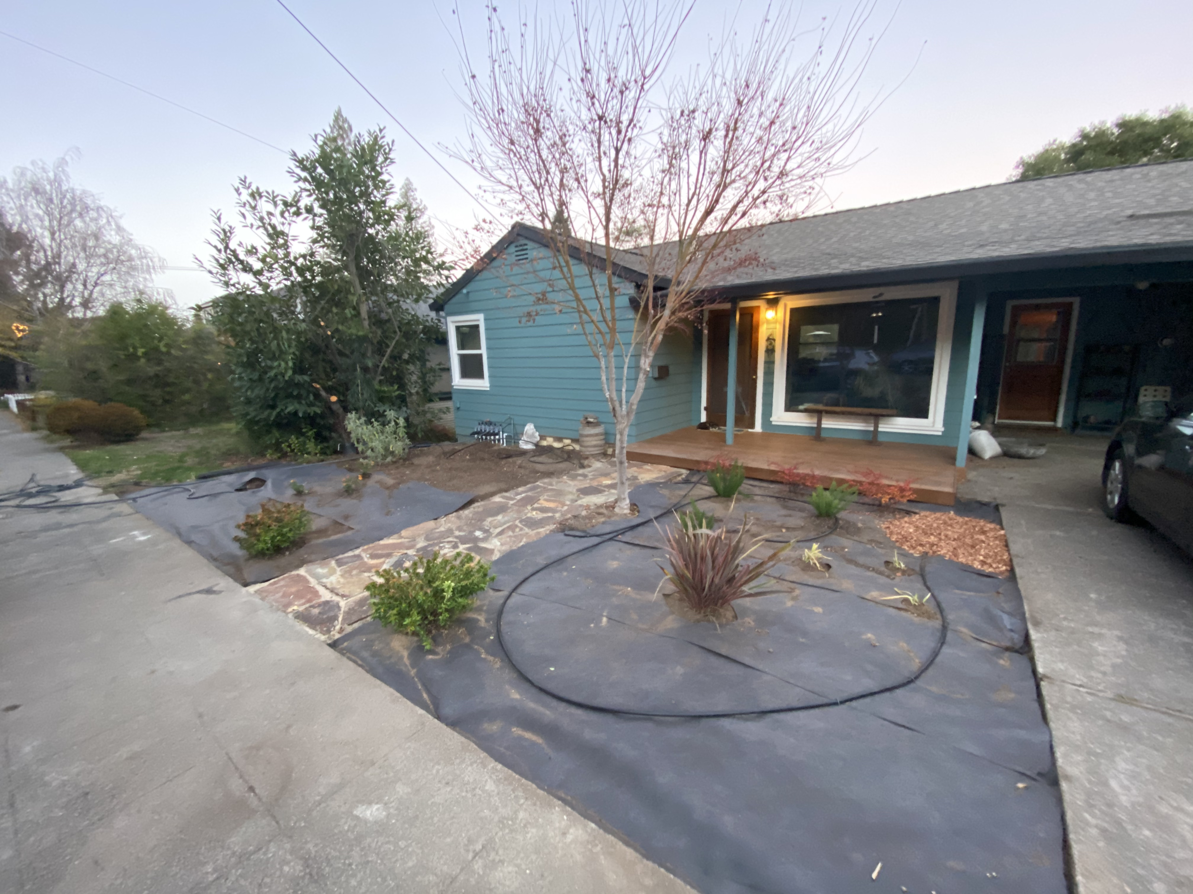 Before - was a blank slate. Added this porch and flagstone walkway before the pic.
