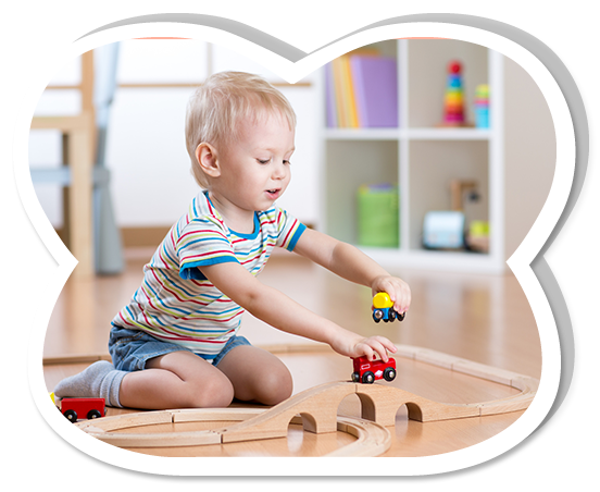 Child Boy Playing With Toys