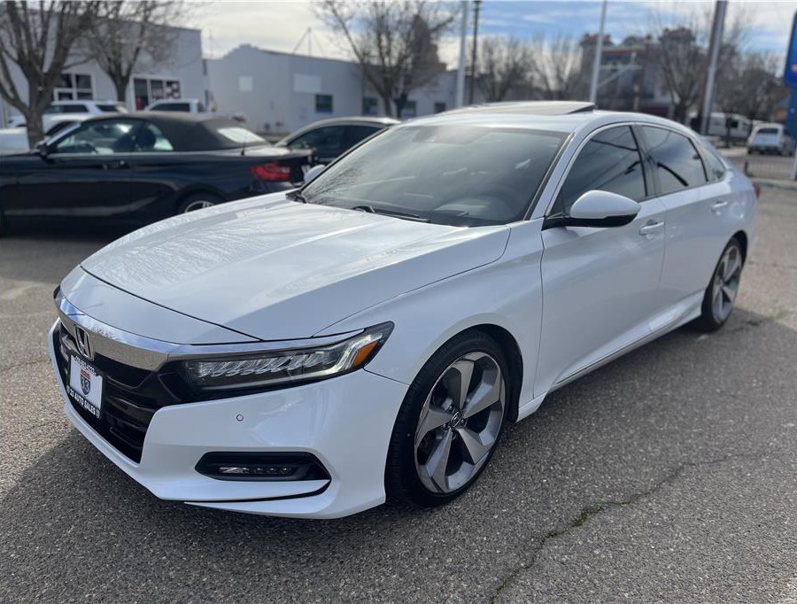 2018 Honda Accord Touring Sedan 4D
Miles: 123,826
Drive: FWD
Trans: Auto, CVT w/Sport Mode
Engine: 4-Cyl, i-VTEC, Turbo, 1.5 Liter
Exterior: White
Interior: Black
Stock: 1518
VIN: 1HGCV1F97JA038039