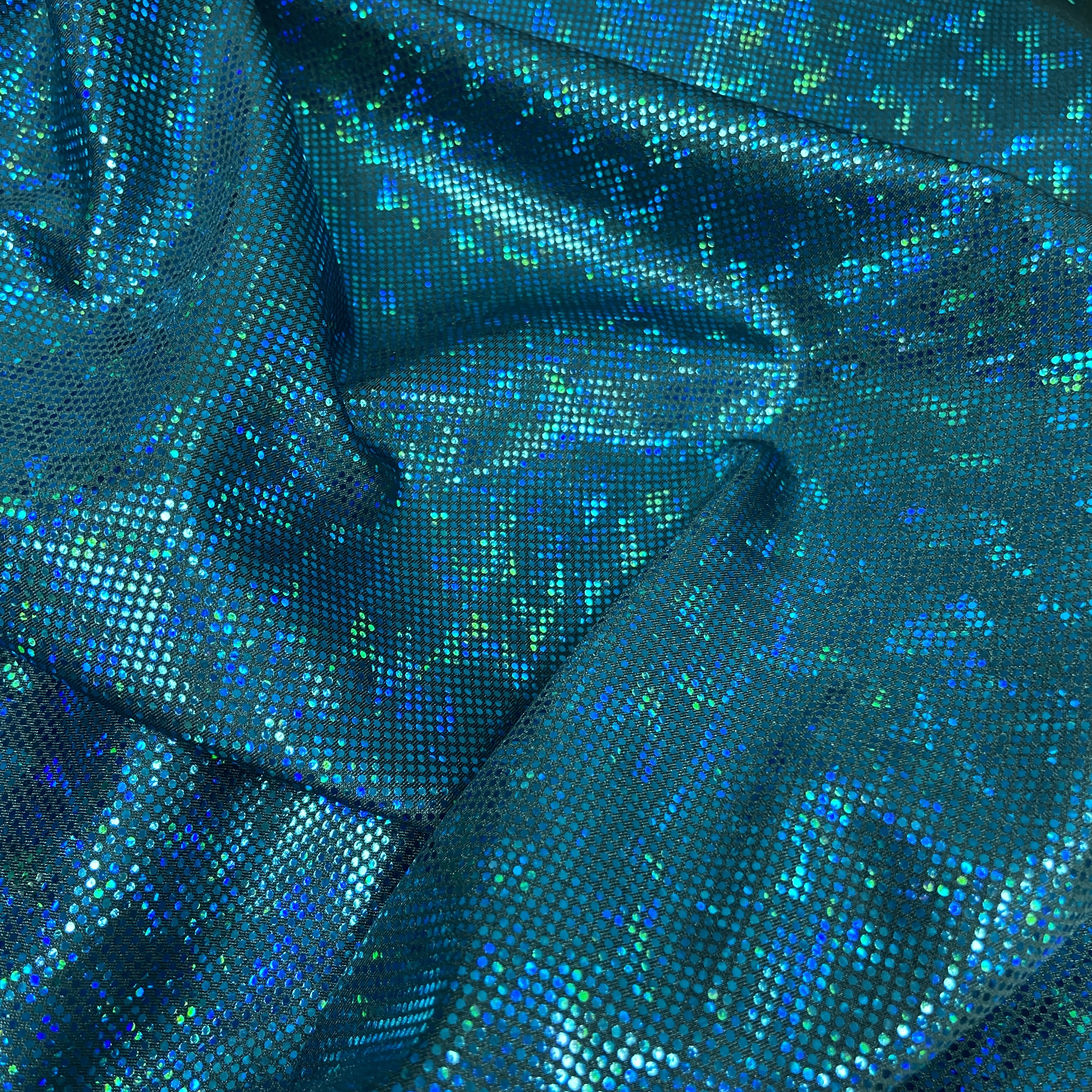 Teal shattered hologram on teal