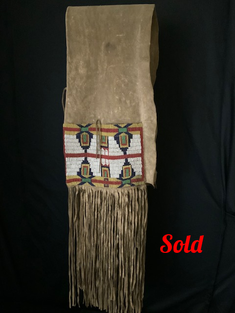 PRODUCT PROFILE:
Product No.: #11256
Description: Cheyenne buffalo
fringe saddle bags.
PRODUCT NARRATIVE :
• Native tanned hide
• Buffalo?
•Sinew sewn native seed beads,
fringe.
• Circa: 1870's
• Size: 74" Length