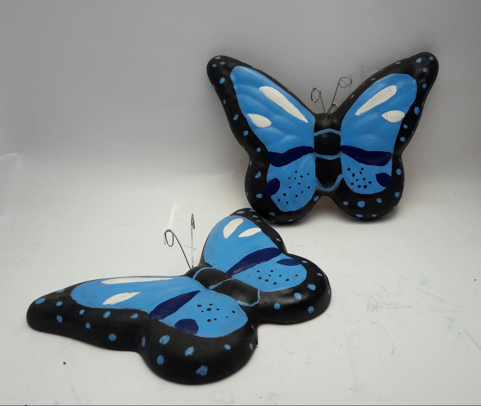https://0201.nccdn.net/1_2/000/000/170/63c/Mariposas-azules-1600x1349.jpg
