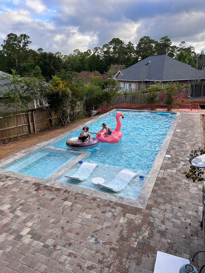 big gunite pool with champagne spa  