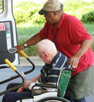 Man helping to elder man Man helping to elder man