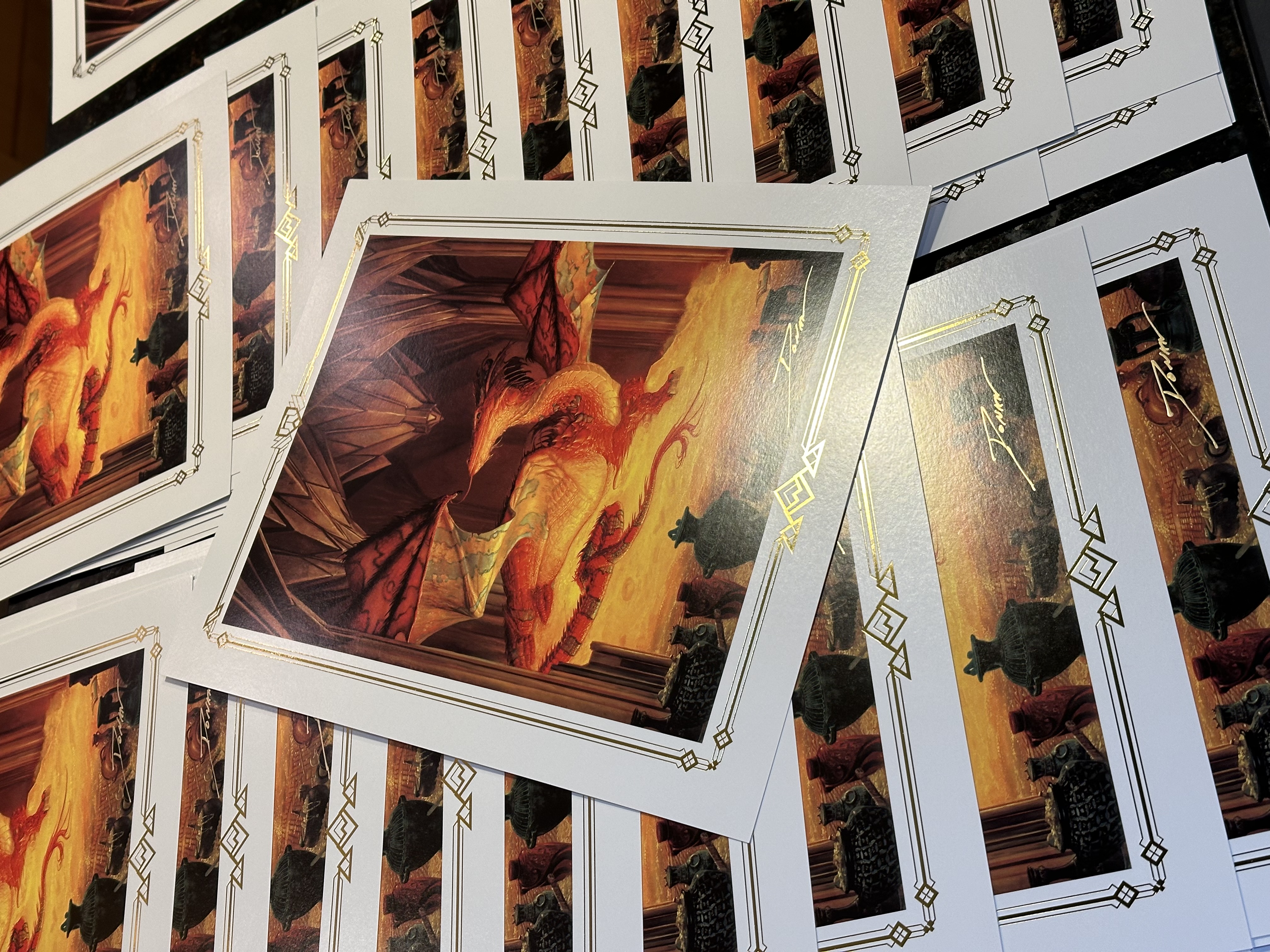 Every visitor will receive a free 14" x 11" gold foiled and signed print of the Great Dragon Smaug from my cover art for 'The Hobbit' edition from the Science Fiction Book Club, 2000.
Limit of 400 pieces.