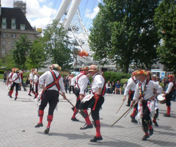 Two teams performing the sword dance at the London Eye
