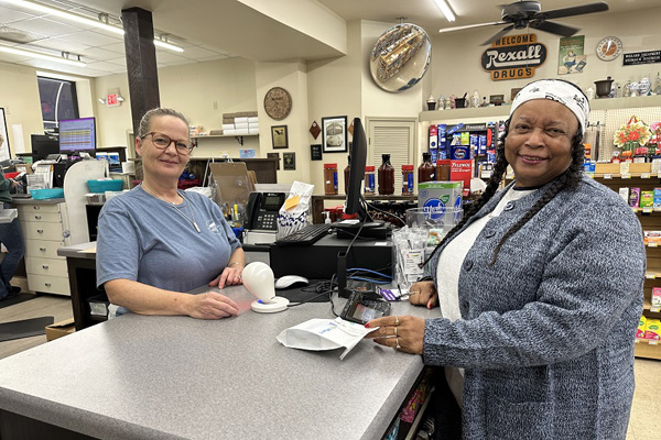 Women serving another women at the counter