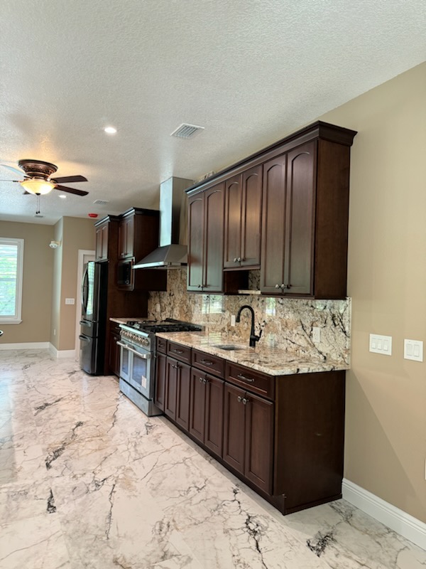 The kitchen bar sink is an ideal area for making morning coffee or evening cocktails. 