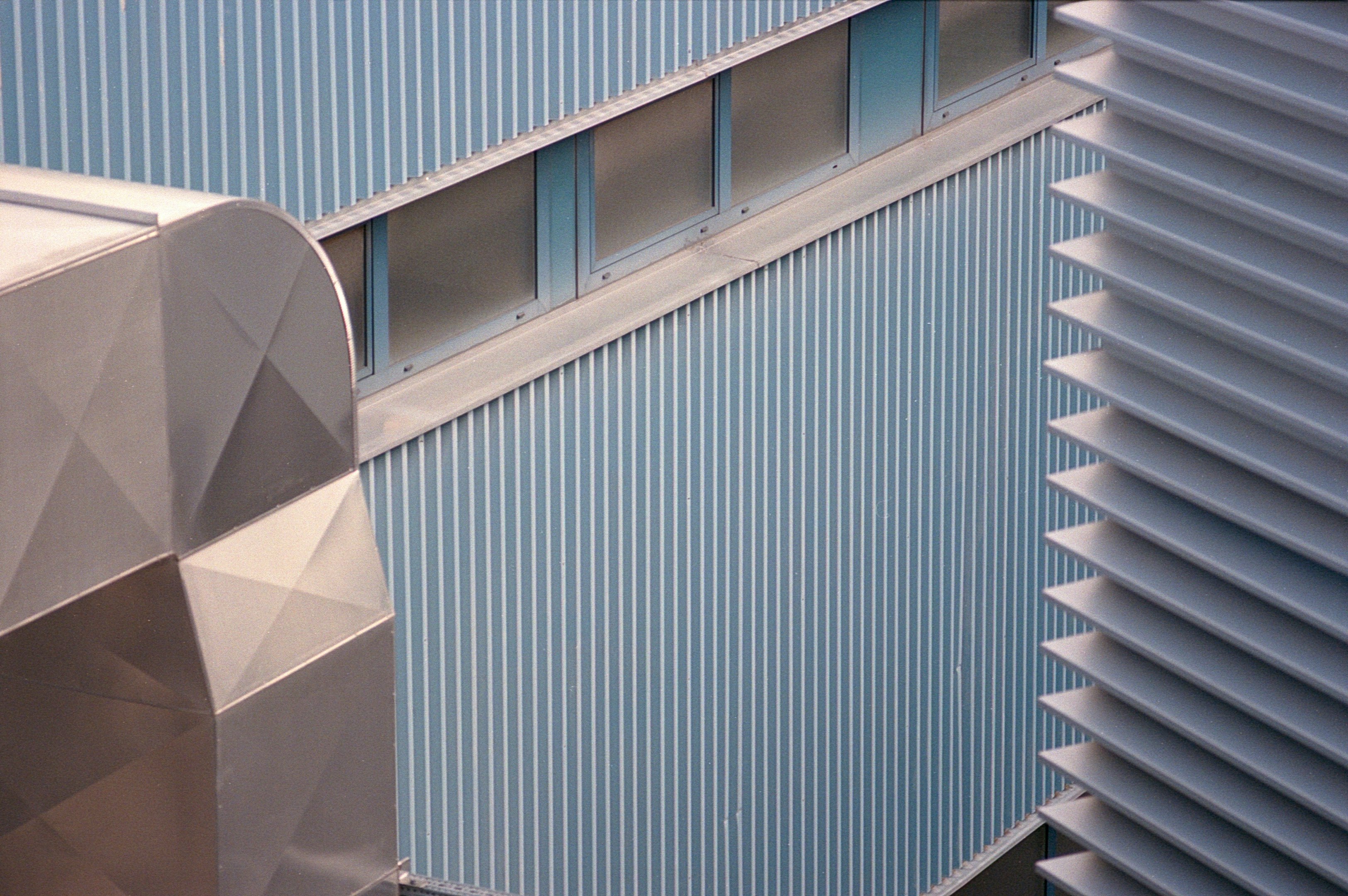 a close up of a building with a sky background