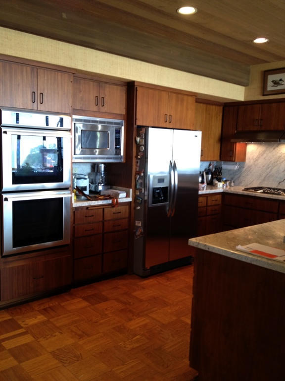 BEFORE -  California coastal outdated dark kitchen.