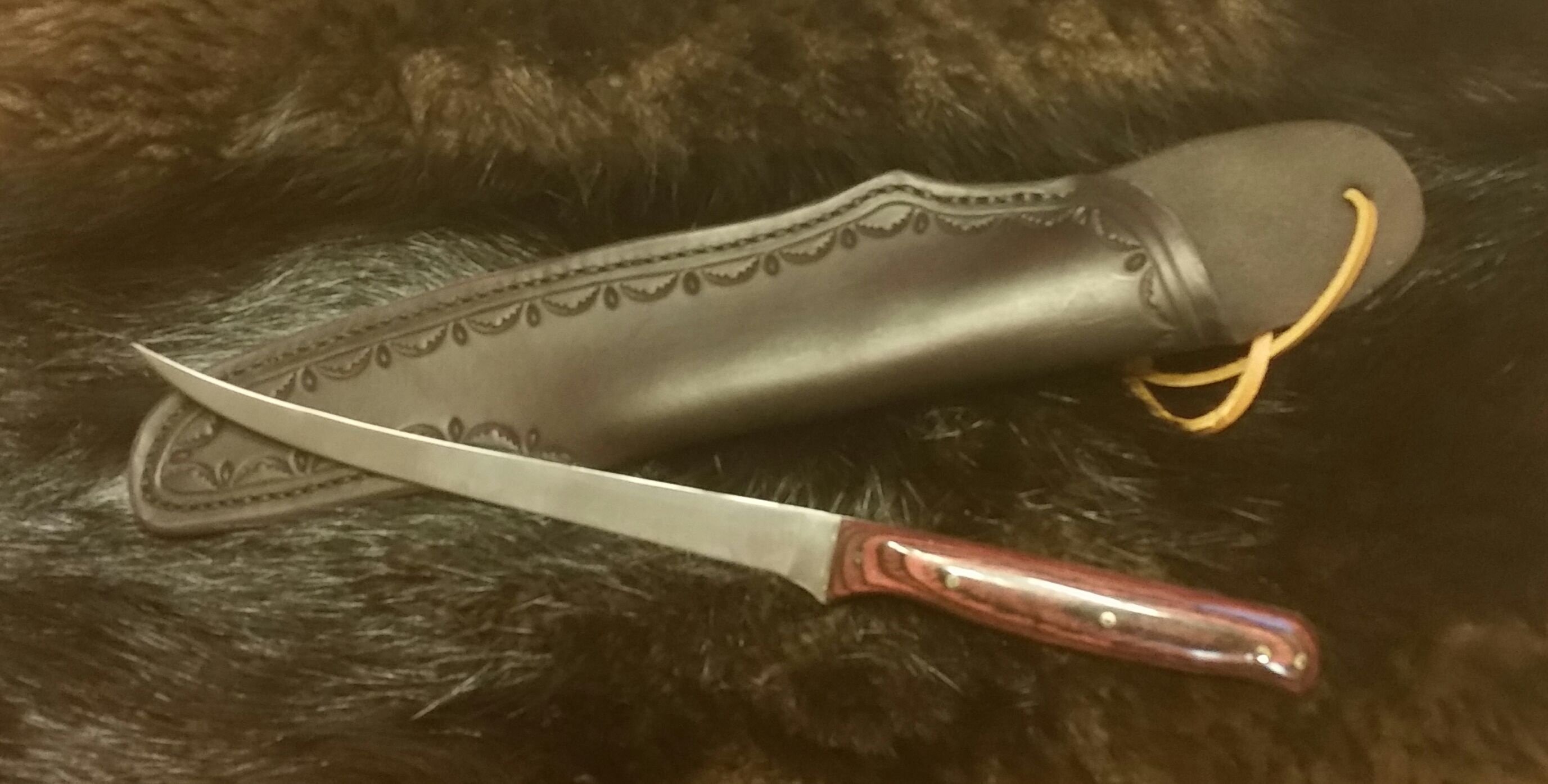 Short Filet Knife with Hand Tooled, Hand Stitched Leather Sheath...  $110.00