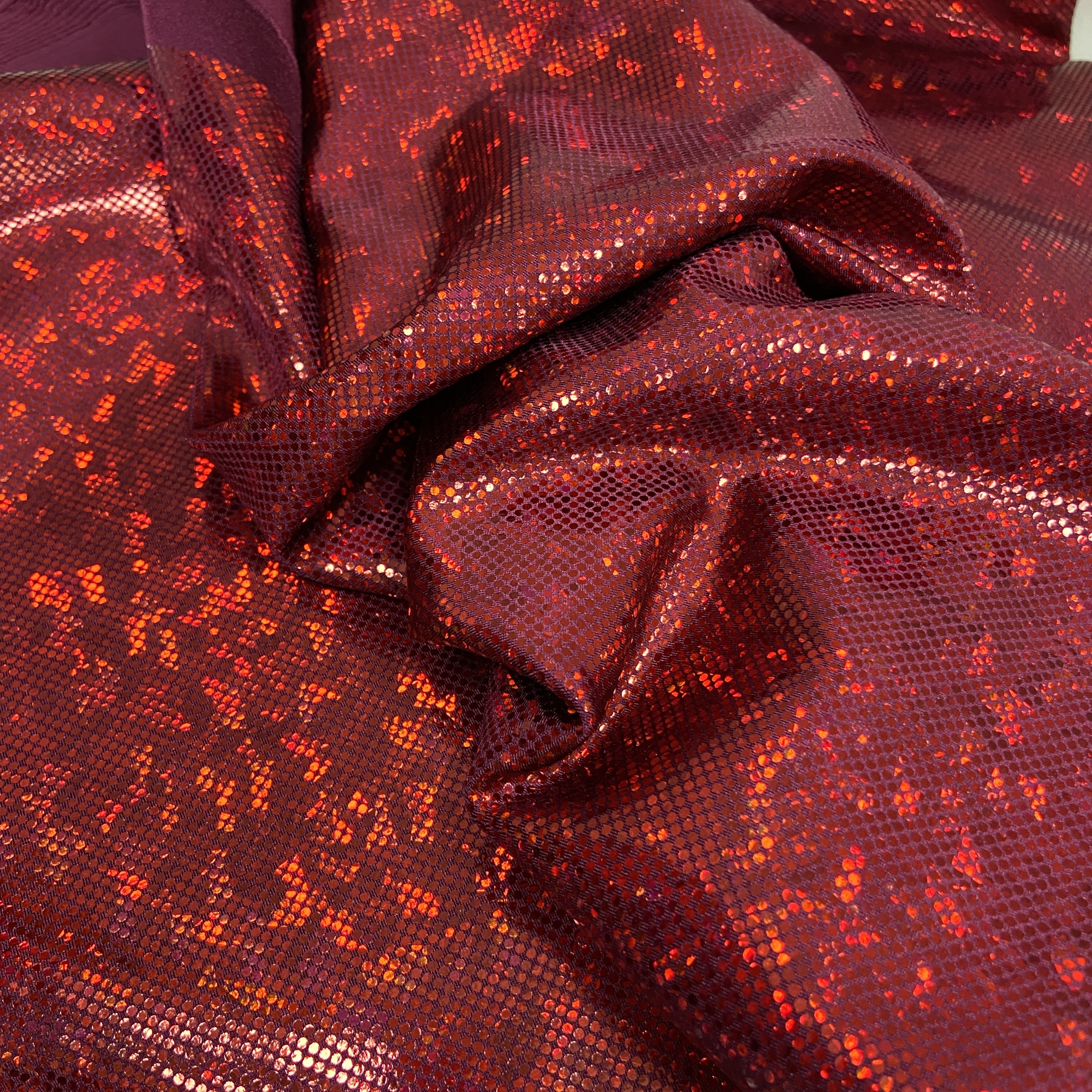 Red shattered hologram on wine 