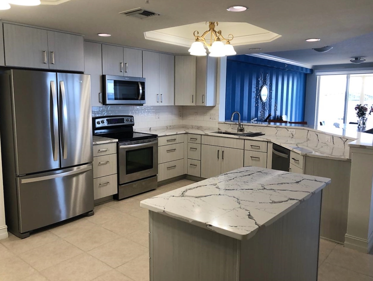 Spacious kitchen featuring large Island for prepping meals and family gatherings.
