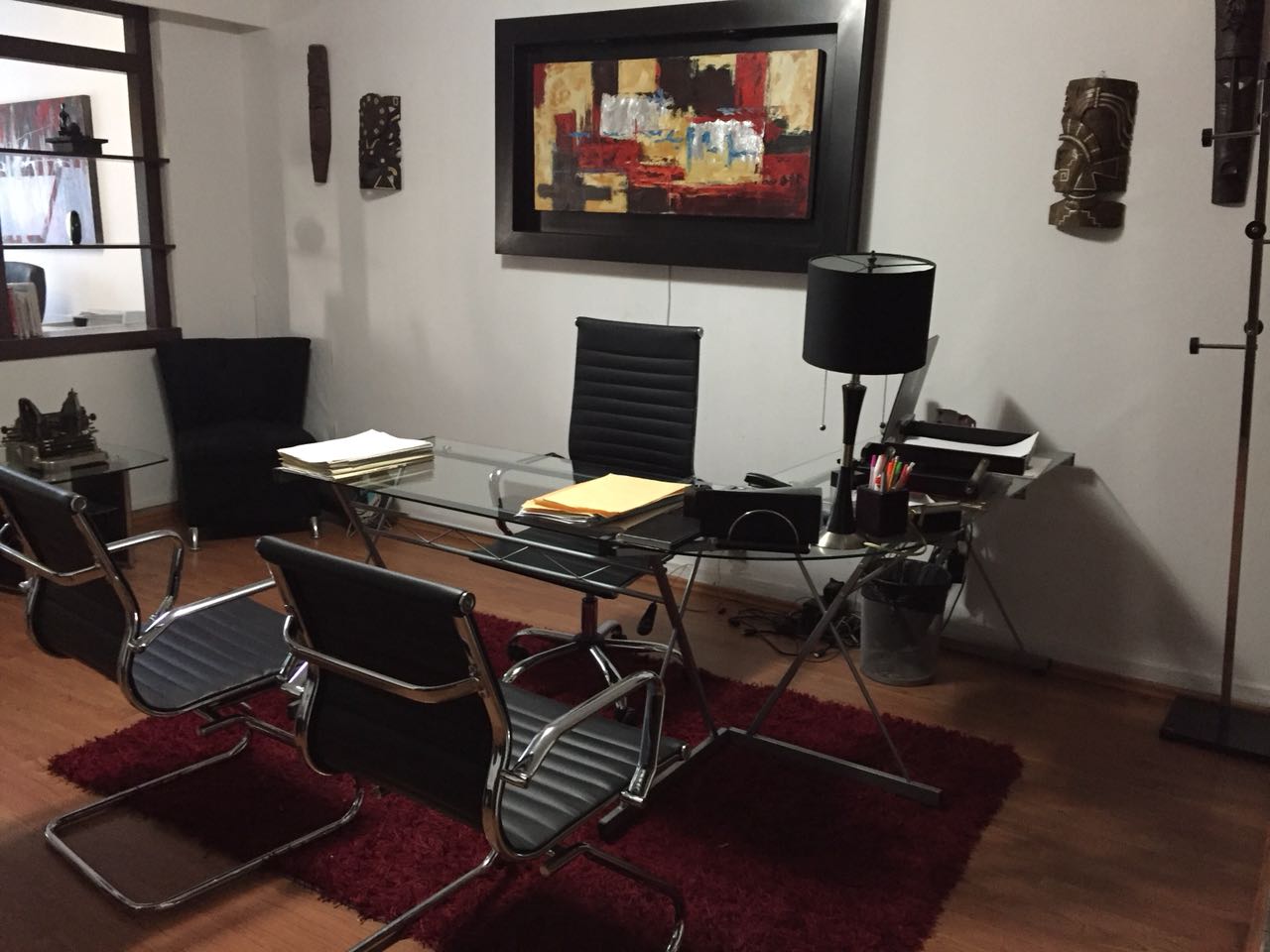 Modern interior with three tables and chairs