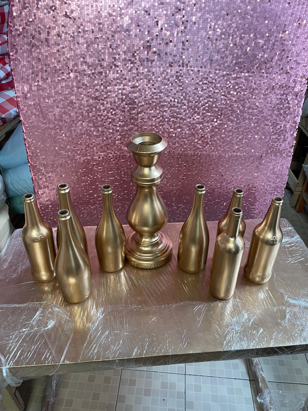 botella vidrio dorado 
$8.000