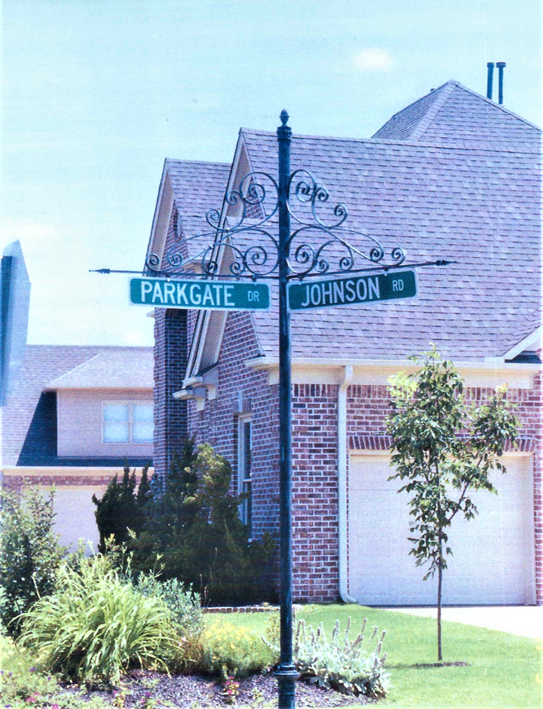 Double arm street sign
 with scrolls 