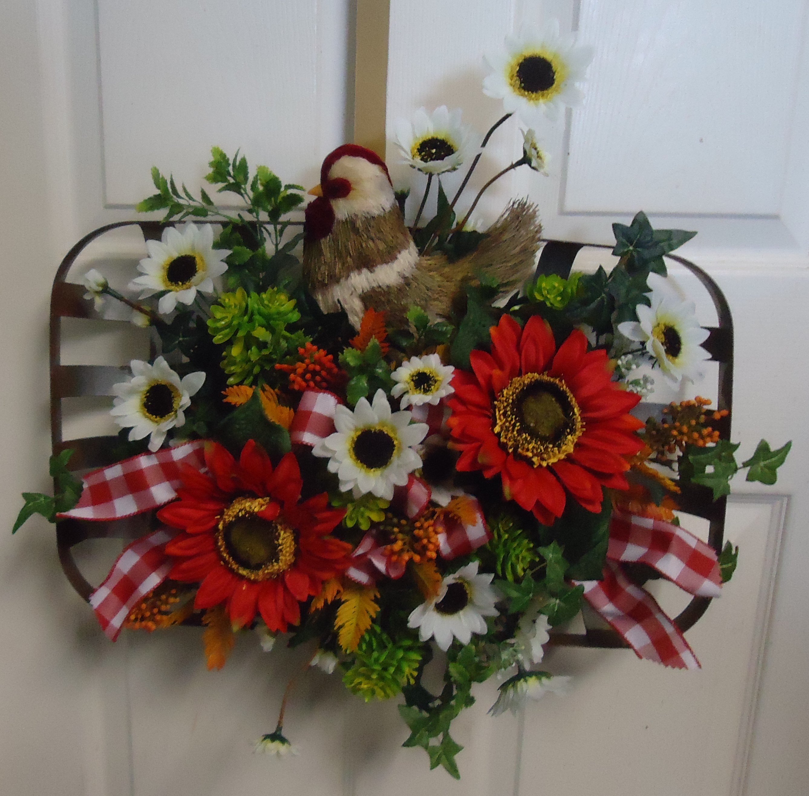 (25B) "Chicken" Wall Arrangement
W/ Sunflowers
$60.00