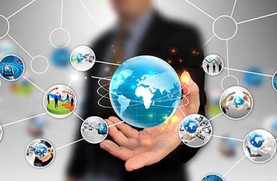 Elderly couple driving a convertible car