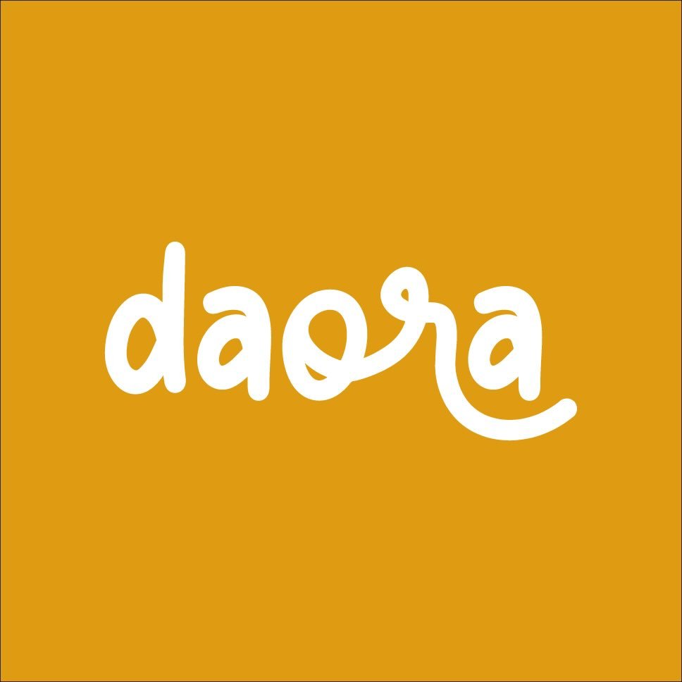 A man with a beard poses for the camera.