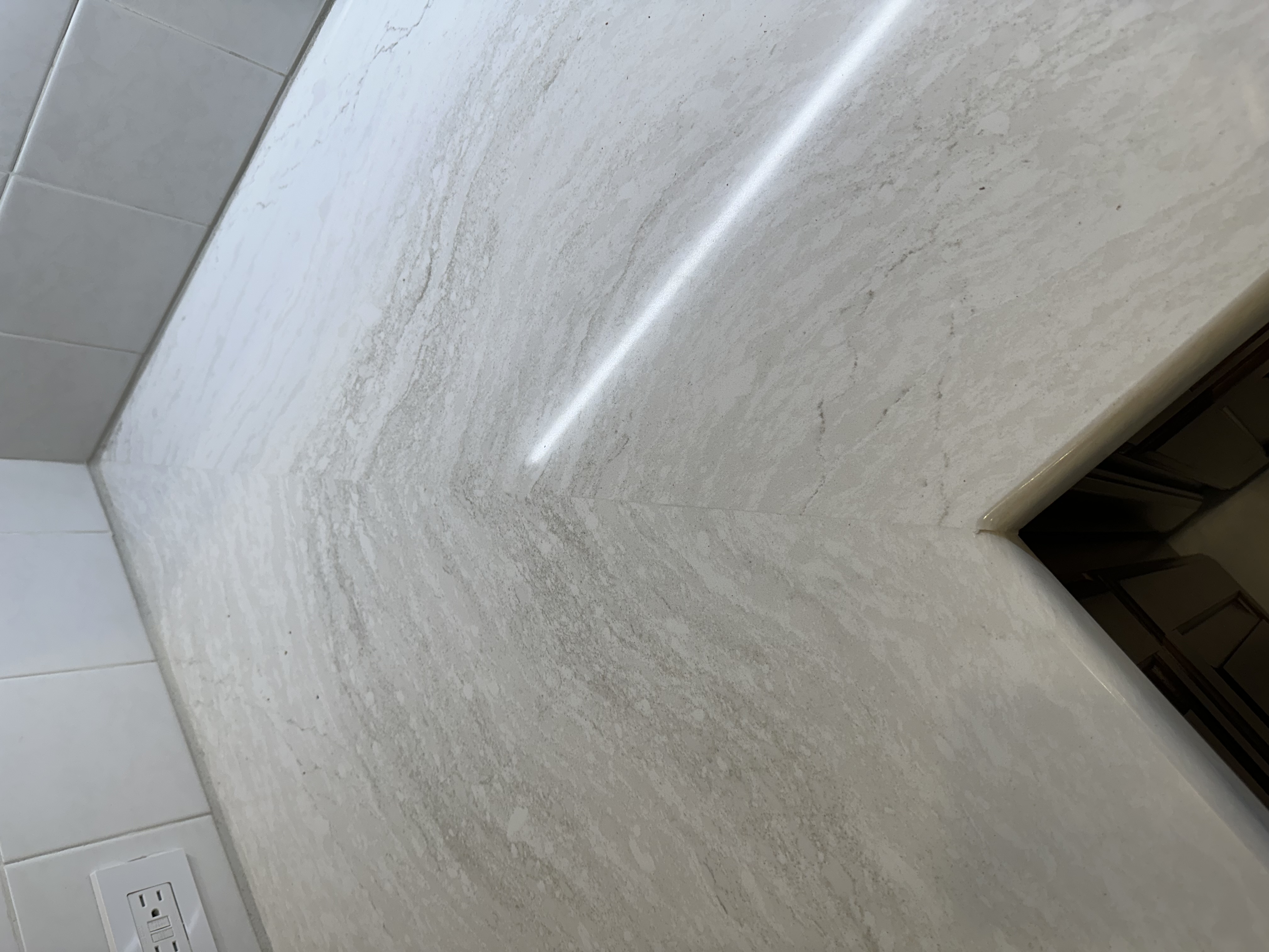 Kitchen countertop featuring a flawlessly matched quartz seam.