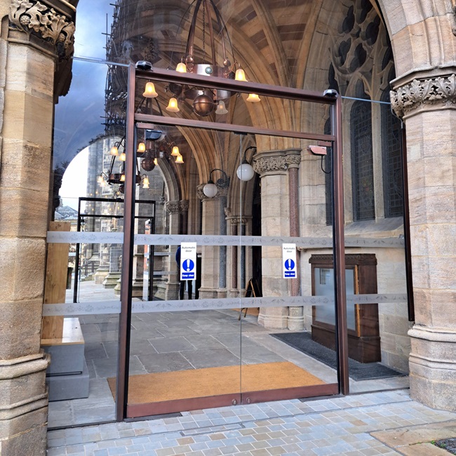 Metal coating - bright bronze finish AM.2 at Rochdale Town Hall.