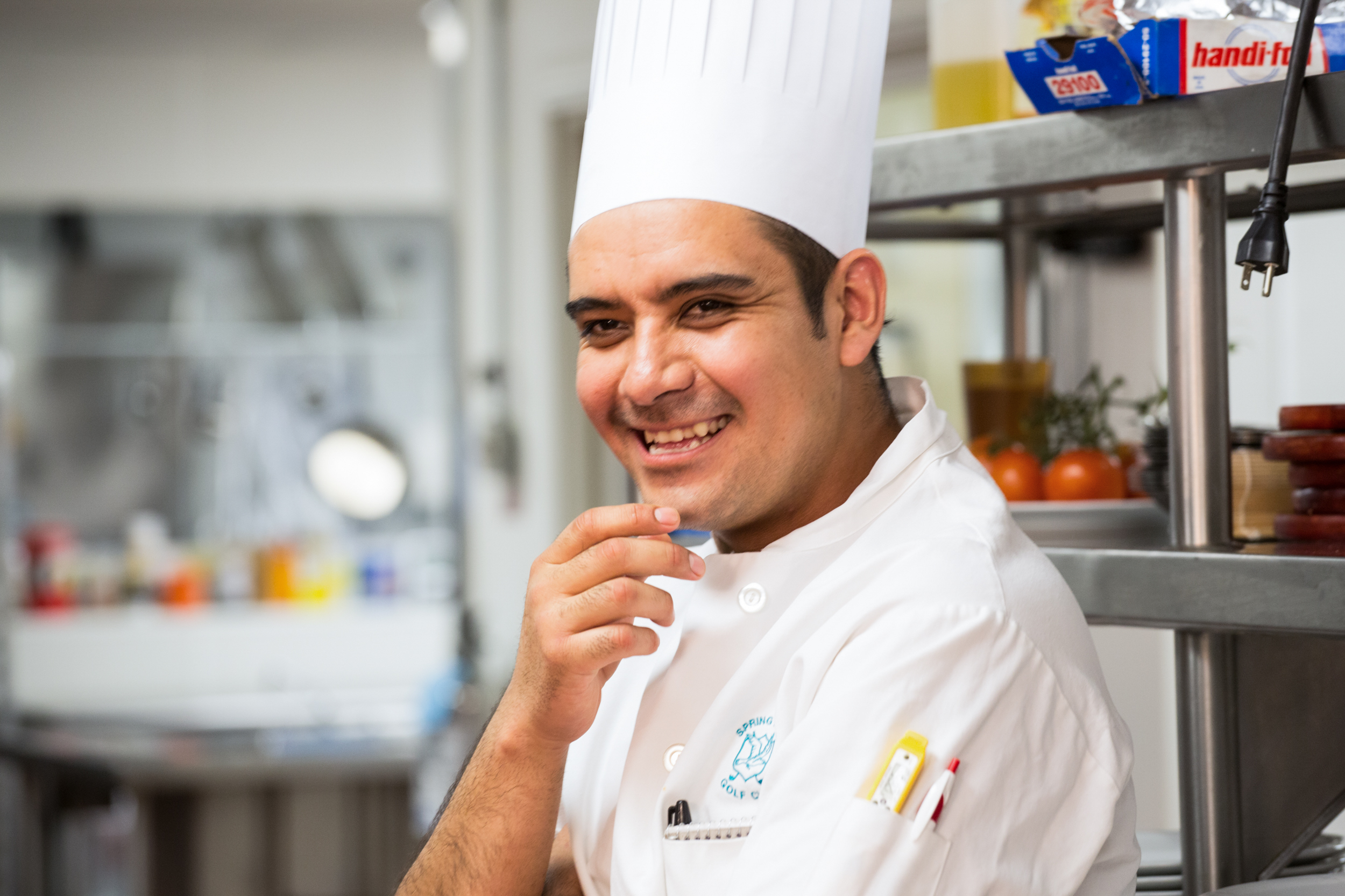 Vintage gas mask with goggles and breathing tube against dark background
