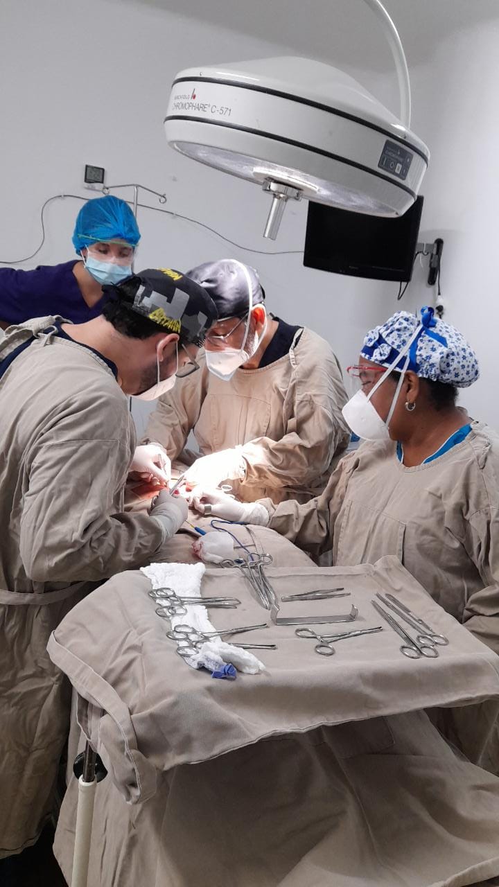 Three young doctors looking at an x-ray